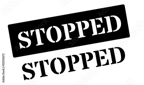 Stopped black rubber stamp on white