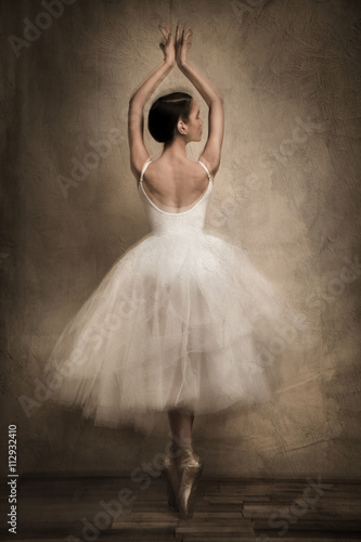 Rear view of female ballet dancer photo