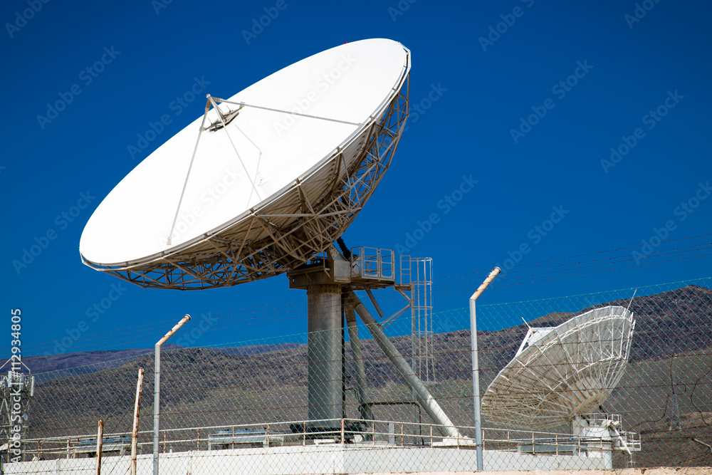 Satellite dish antennas with blue sky.Satellite dish antennas Satellite dish antennas with blue sky.Satellite dish antennas