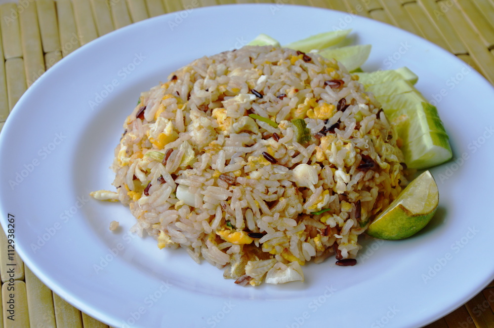 fried mixed white and brown rice with crab meat on dish