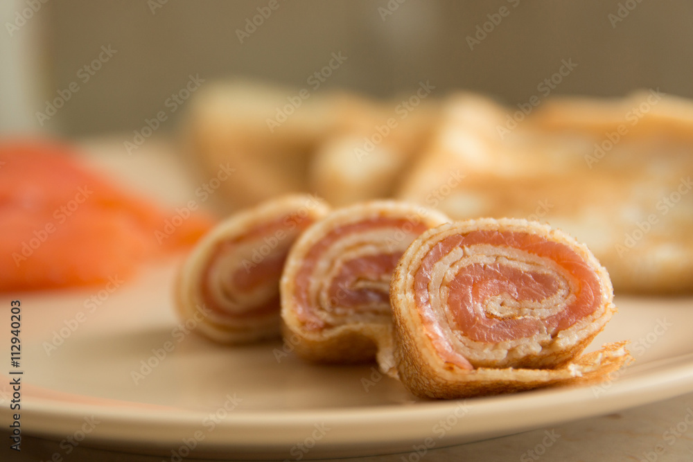 Rolled pancakes with smoked salmon Rolled pancakes with smoked salmon