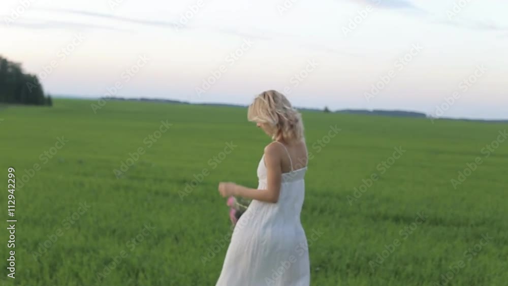 a beautiful woman runs across the field a beautiful woman runs across the field