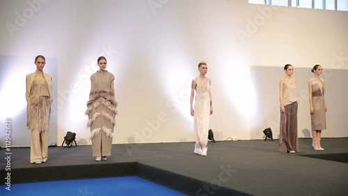 Model with a tattoo on the podium