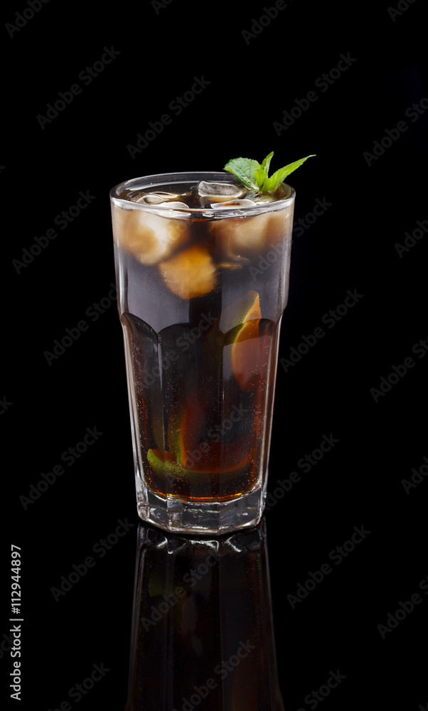 Rum and Cola Cuba Libre with Lime and Ice ver black background Rum and Cola Cuba Libre with Lime and Ice ver black background