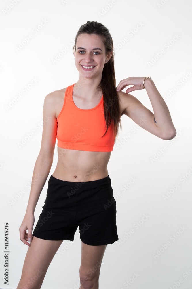 A very skinny woman wearing sport wear with long hair Stock Photo | Adobe  Stock