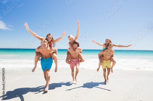  Friends having fun at the beach