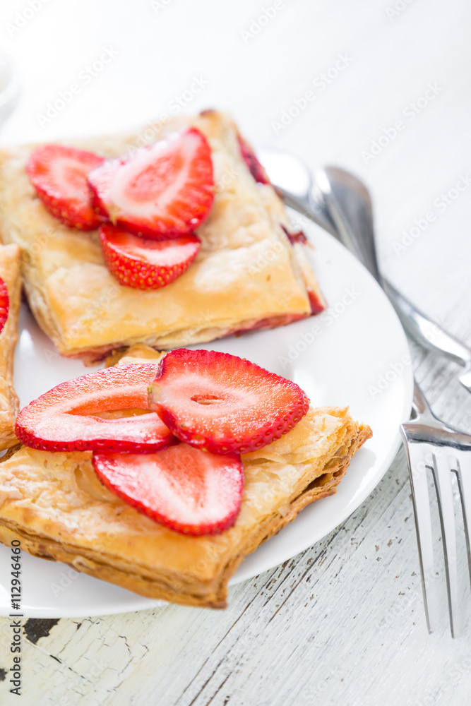 Cake of puff pastry with fresh strawberries Cake of puff pastry with fresh strawberries