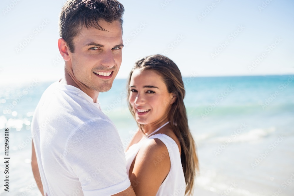 Cute couple posing and smiling Cute couple posing and smiling