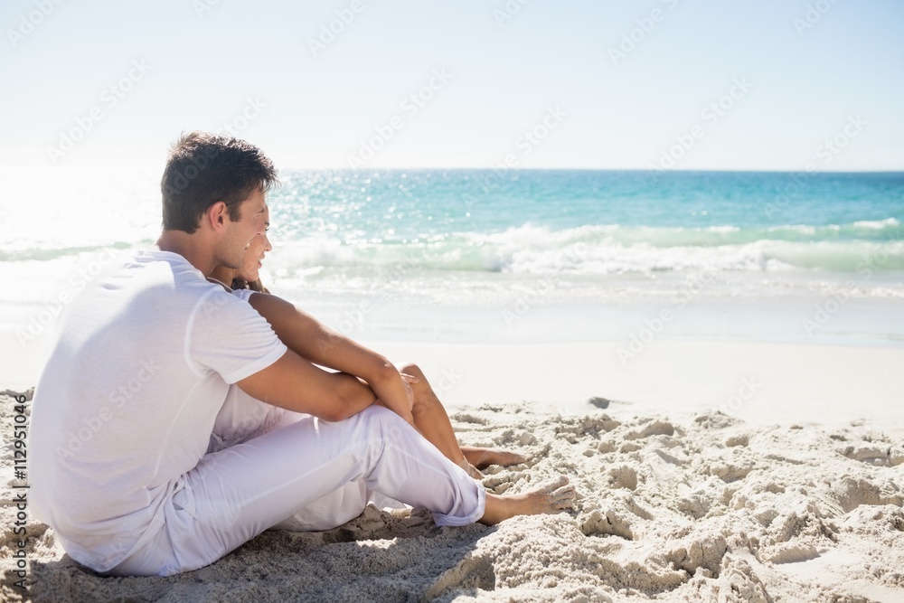 Cute couple sitting down