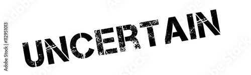 Uncertain black rubber stamp on white