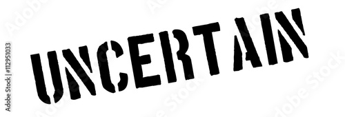 Uncertain black rubber stamp on white