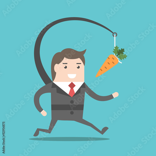 Businessman chasing carrot
