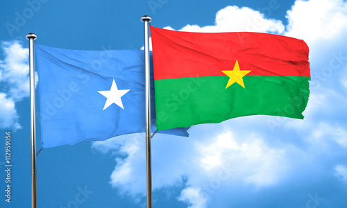 Somalia flag with Burkina Faso flag, 3D rendering