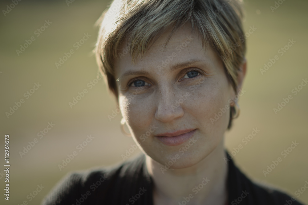 portrait of a young woman with short hair portrait of a young woman with short hair