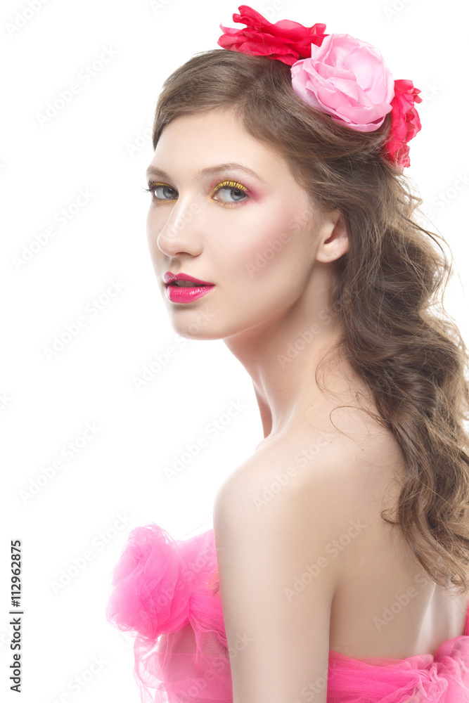 Gentle portrait turns into a girl in pink isolated on white background