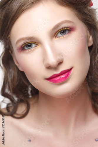 Person cute smiling girl with make-up in pink tones
