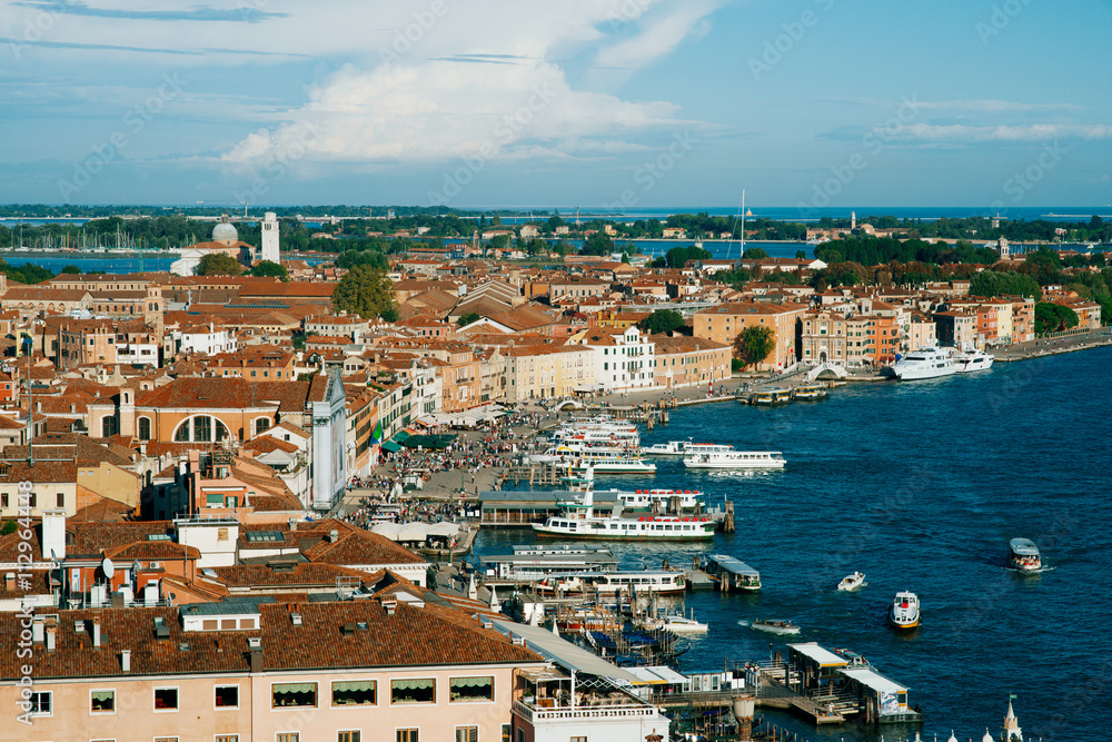 Venice, Italy, October 28, 2014: A view of the Venetian lagoon and waterfront Riva degli Schiavoni.
