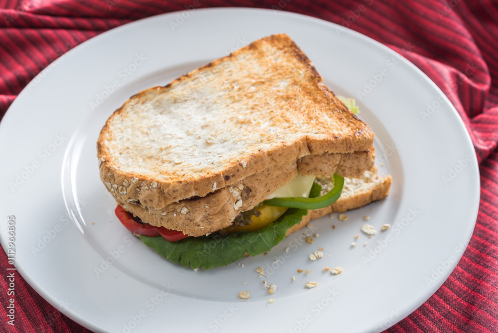 Food series : Egg sandwich whole wheat bread on white plate Food series : Egg sandwich whole wheat bread on white plate
