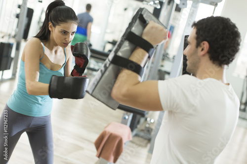 Young woman boxing in the gym