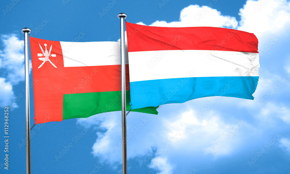 Oman flag with Luxembourg flag, 3D rendering Oman flag with Luxembourg flag, 3D rendering