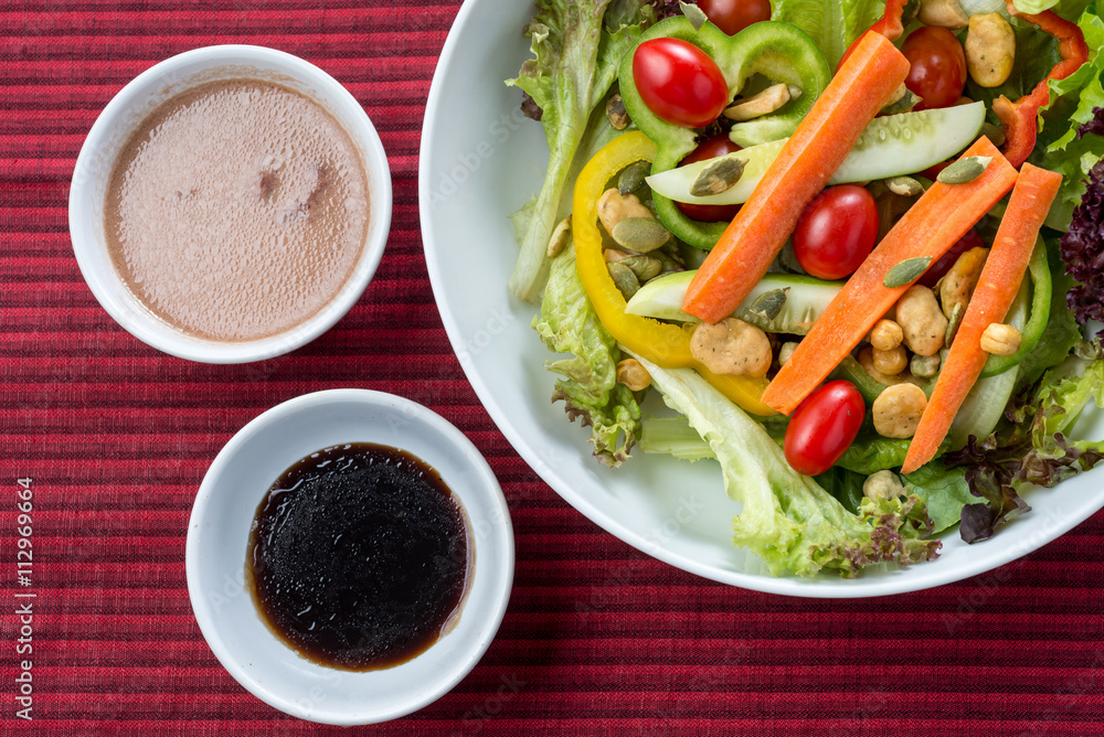 Food series : Salad on red table cloth with balsamic vinegar Food series : Salad on red table cloth with balsamic vinegar