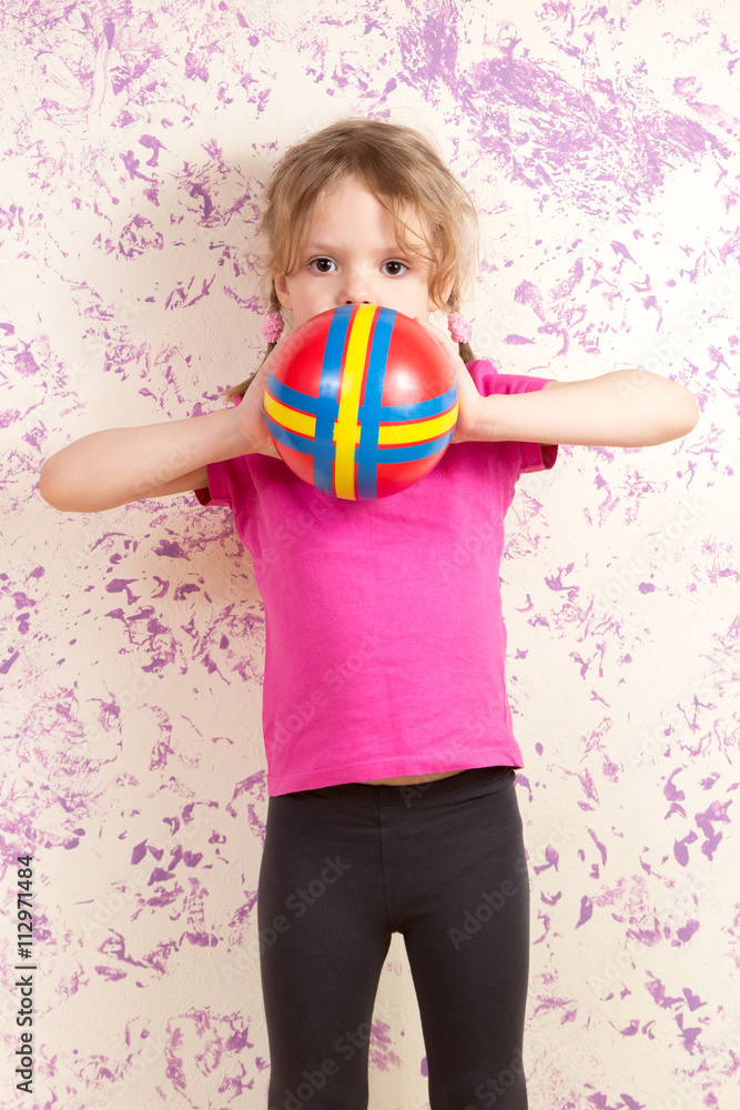 cute little girl with small ball
