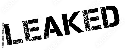 Leaked black rubber stamp on white