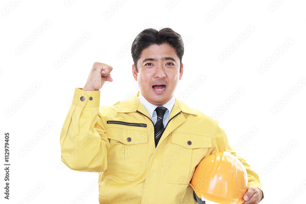 ガッツポーズの労働者