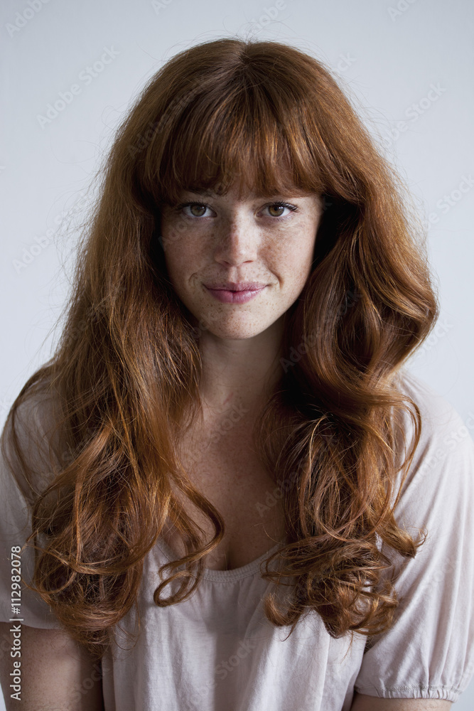 A beautiful young red haired woman, portrait A beautiful young red haired woman, portrait