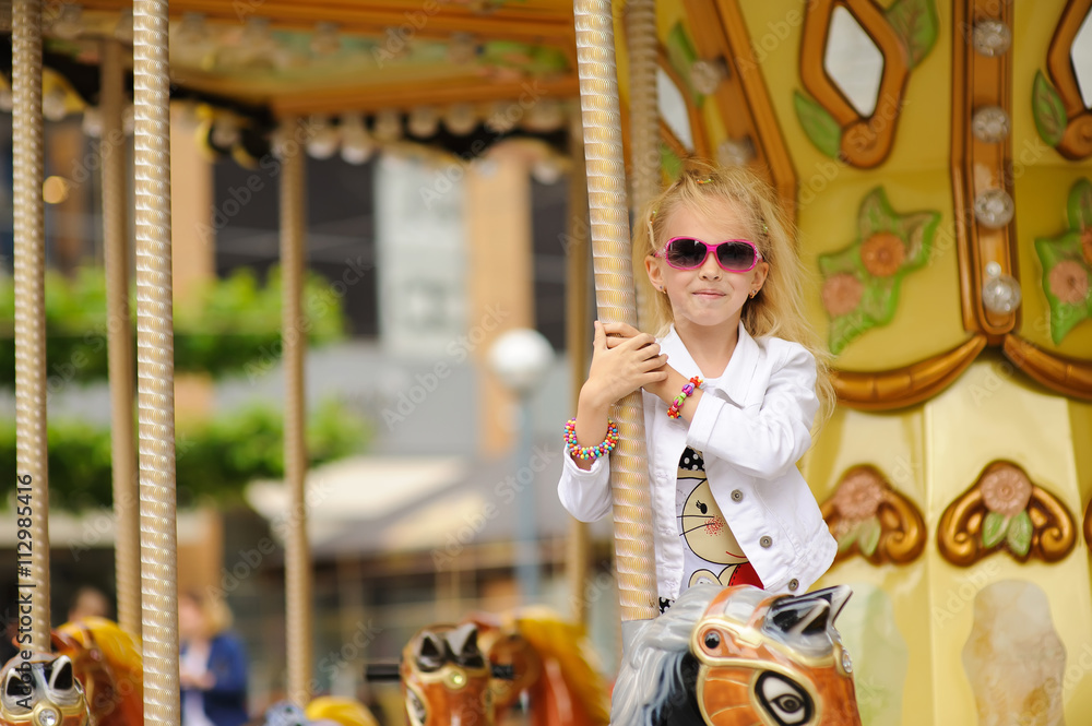Child On Carousel Child On Carousel