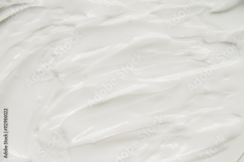 Cosmetics. Cream white background texture.