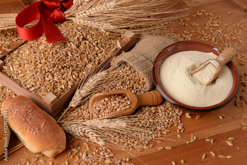 buckwheat with wheat flour and ears photo