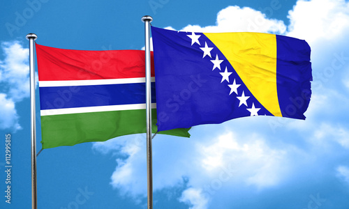 Gambia flag with Bosnia and Herzegovina flag, 3D rendering