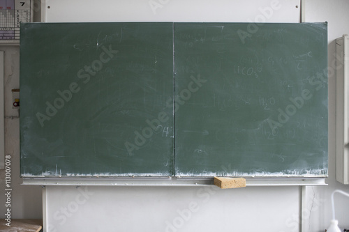 Blackboard and sponge photo