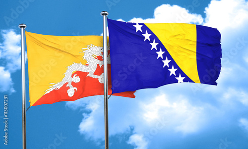 Bhutan flag with Bosnia and Herzegovina flag, 3D rendering