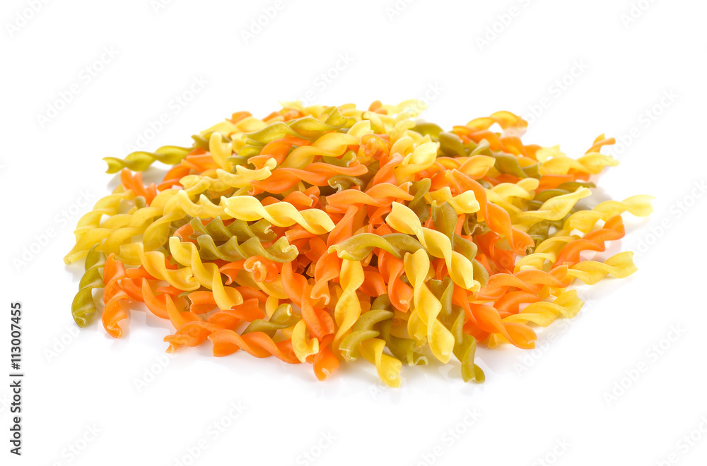 pile of small vegeroni Rotini spirals pasta on white background pile of small vegeroni Rotini spirals pasta on white background