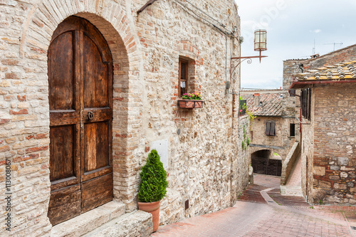 Old street in medieval town San Gimignano  Tuscany  Italy