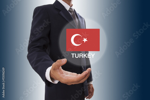Businessman hand showing Turkey Flag 