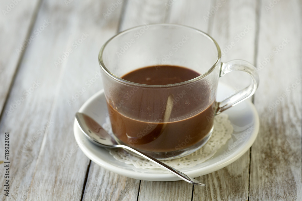 Cup of coffee on a wooden table Cup of coffee on a wooden table