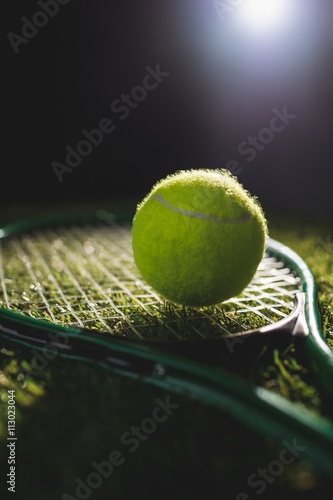 Close up of tennis ball with racket © WavebreakMediaMicro