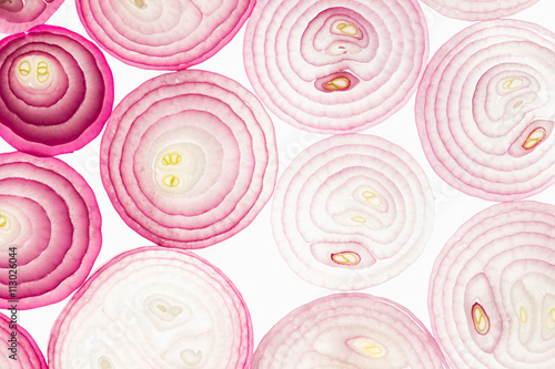 Sliced pink onion. Slices. Pattern. Macro. Texture. Food background.