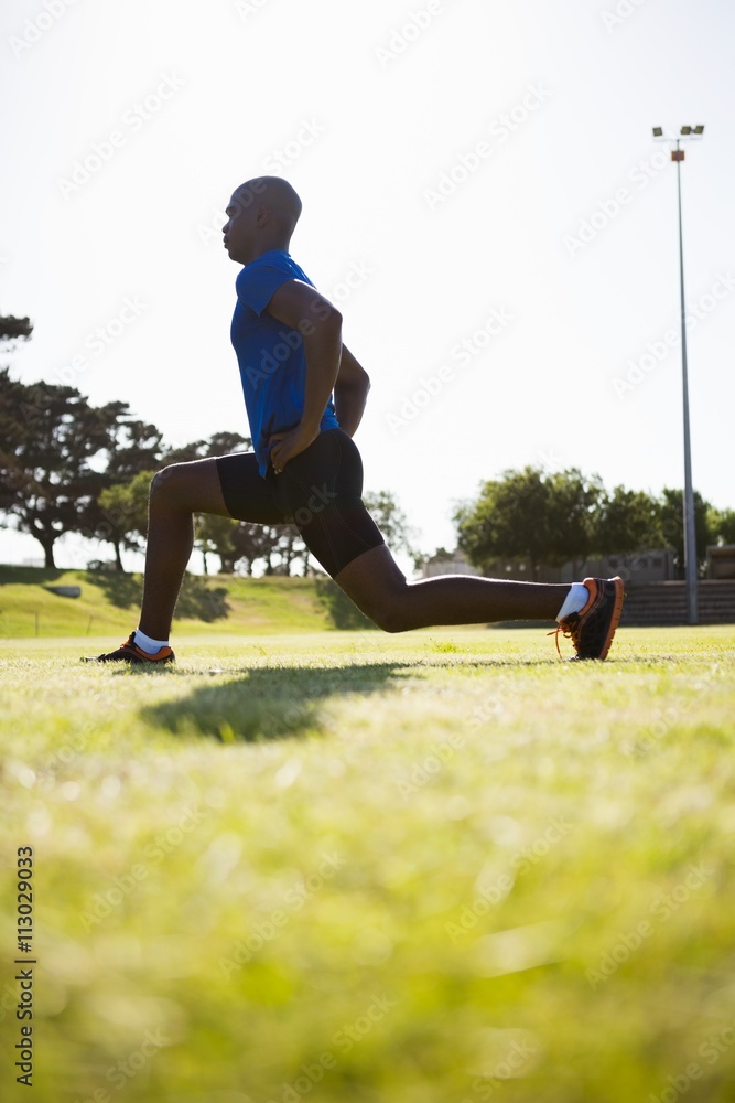 Obraz premium Athlete warming up in a stadium