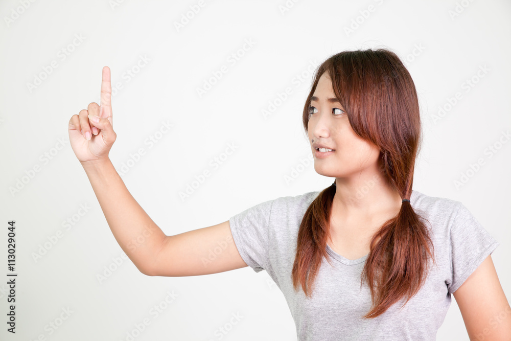 Asian woman with finger point up. Asian woman with finger point up.