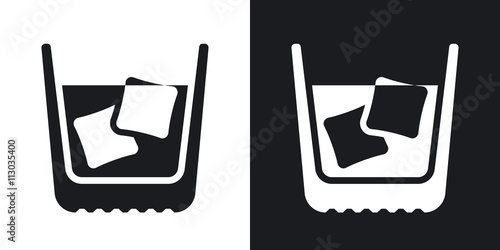Glass of whiskey with ice. Vector icon. Two-tone version on black and white background