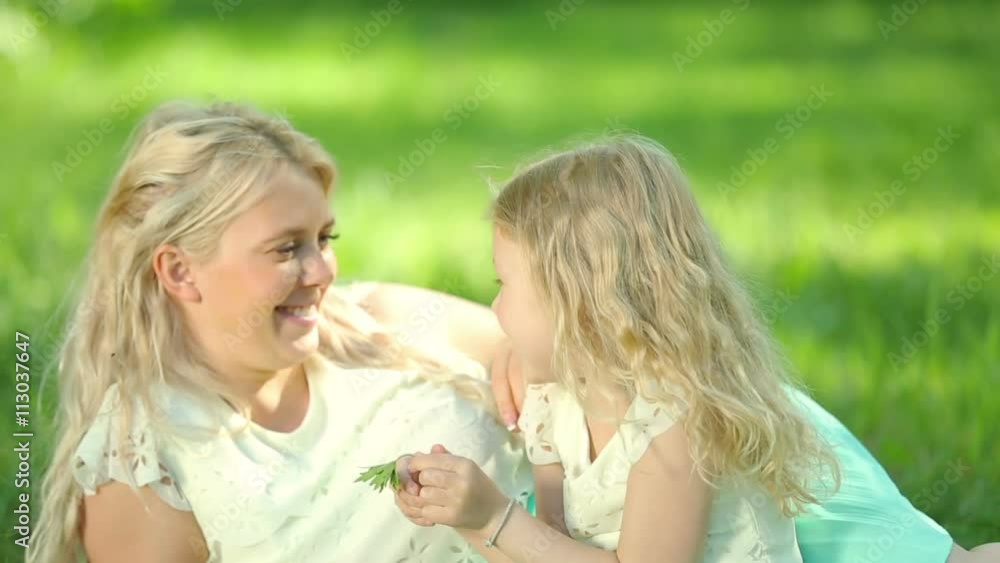 Young pregnant mother plays with her daughter. Happy family. Young pregnant mother plays with her daughter. Happy family.