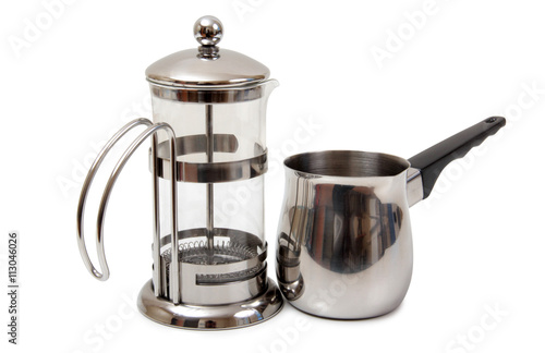 Metal and glass pots for coffee on a white background