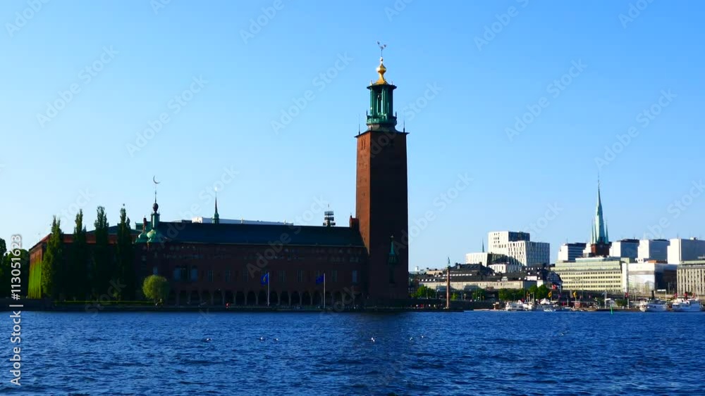 STOCKHOLM, SWEDEN, JUNE 2016: A tracking shot view of Stockholm city center and old town from inside the water STOCKHOLM, SWEDEN, JUNE 2016: A tracking shot view of Stockholm city center and old town from inside the water