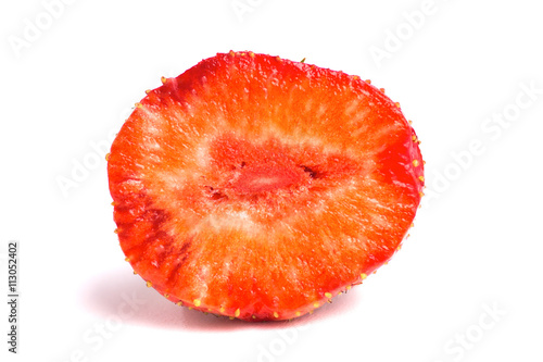 half strawberries on a white background