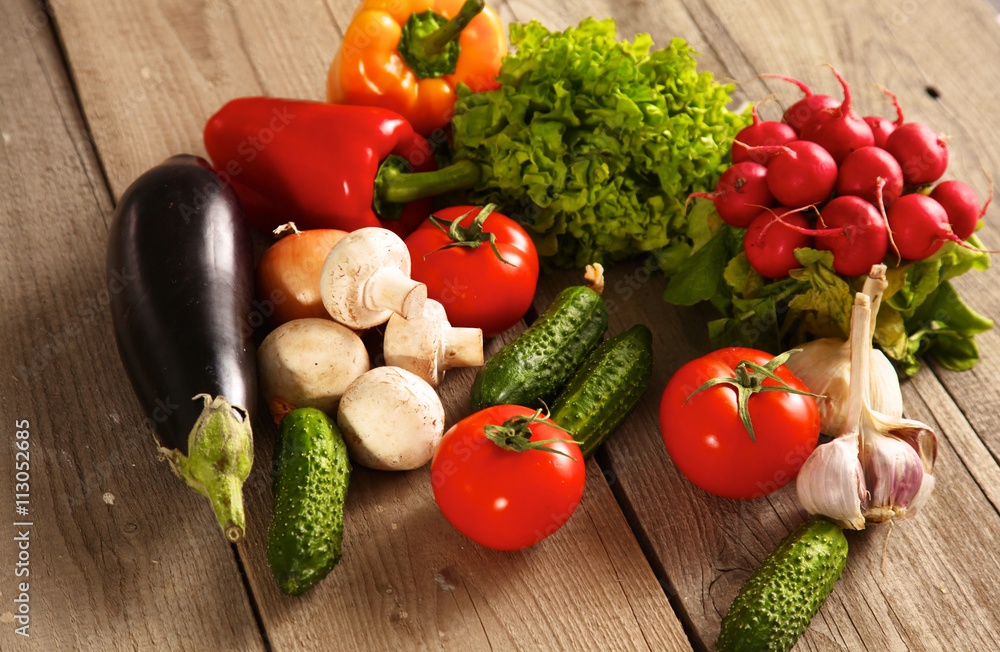 Fresh vegetables on a clean wooden table Fresh vegetables on a clean wooden table