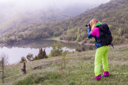 Photographer on the river © patrisyu